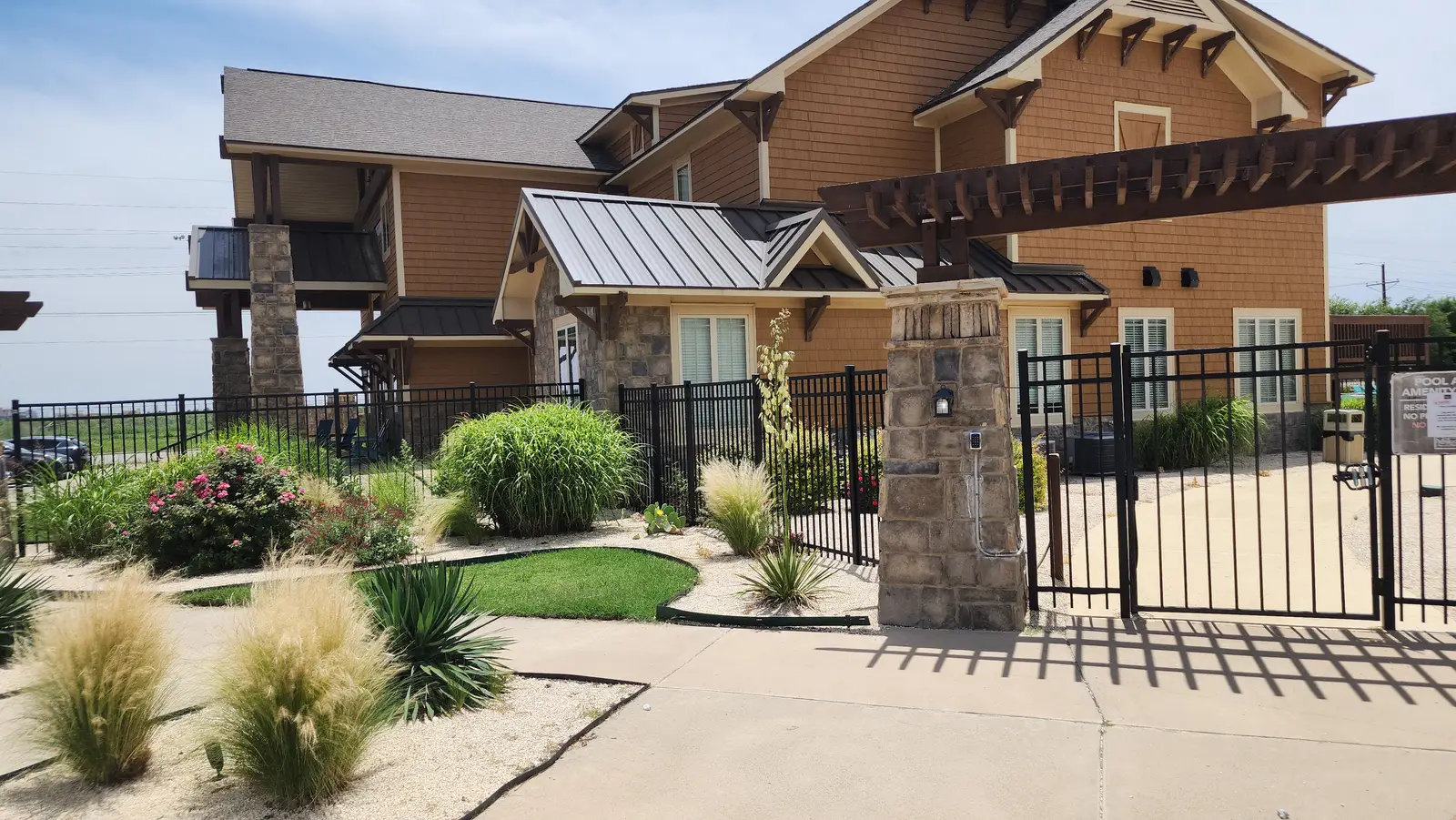 Metal roof gated clubhouse entrance